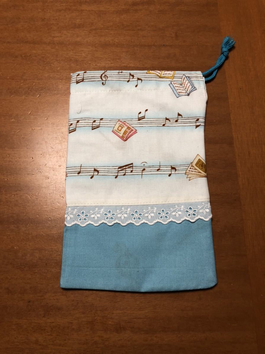** musical score * sound .( light blue )* pouch small ( lining attaching )