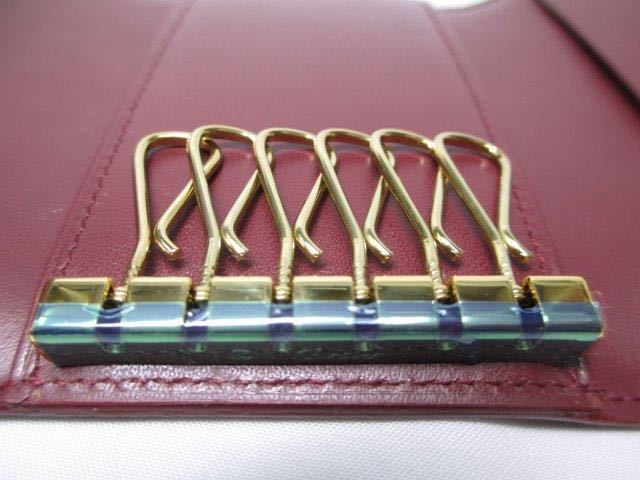 未使用品 カルティエ 6連キーケース エンジ 革 カルティエレッド 本物