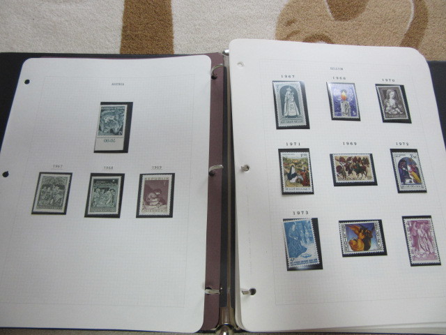 クリスマスに関する国連や各国発行の切手コレクション 約61リーフ バインダー入り