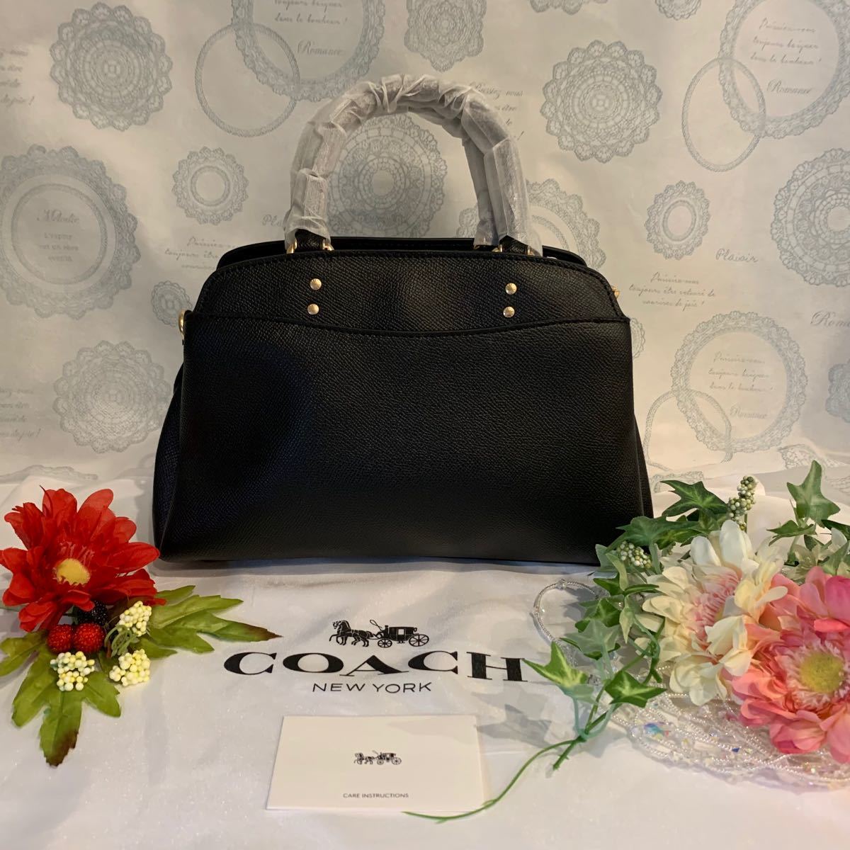 定番の中古商品 COACH コーチ 紫 ブラック パープル シンプル 革 巾着