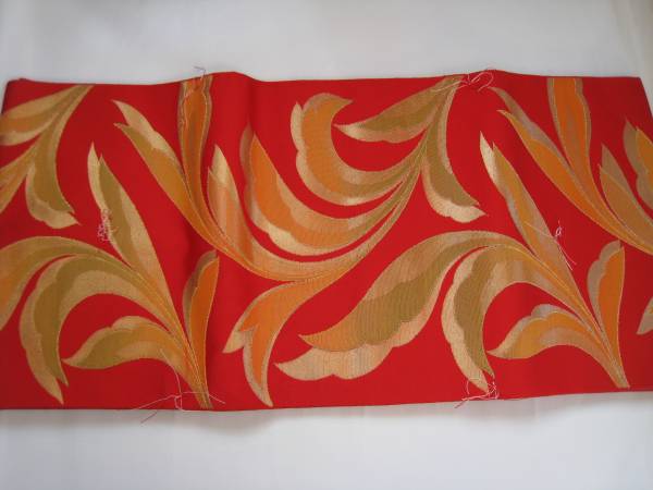 019 なごや帯　化繊　赤系　綺麗な品　巾３１ｃｍ　未使用_画像1