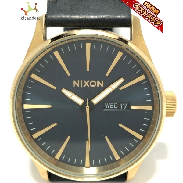 NIXON ニクソン 77%OFF 腕時計 - ネーム刻印 【91%OFF!】 RHC ゴールド×ダークネイビー レディース