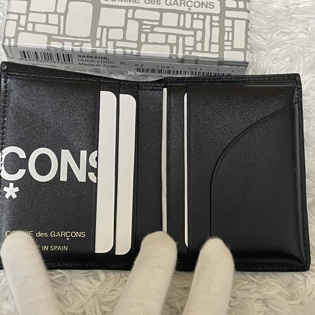 新品未使用】COMME des GARCONS 二つ折り 財布 ブラック | www