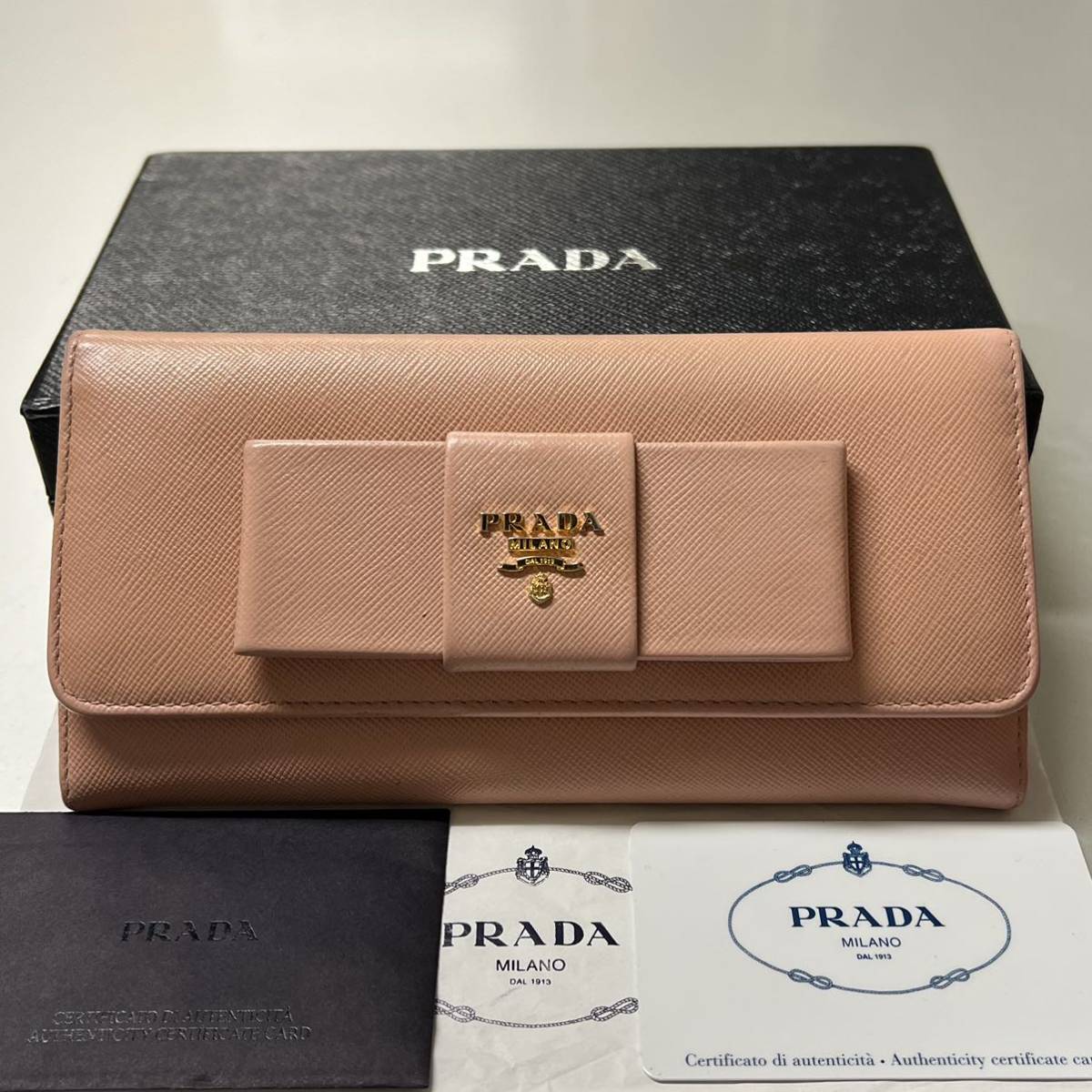 【返品?交換対象商品】小物未使用に近い プラダ PRADA 財布 長財布 リボン サフィアーノレザー