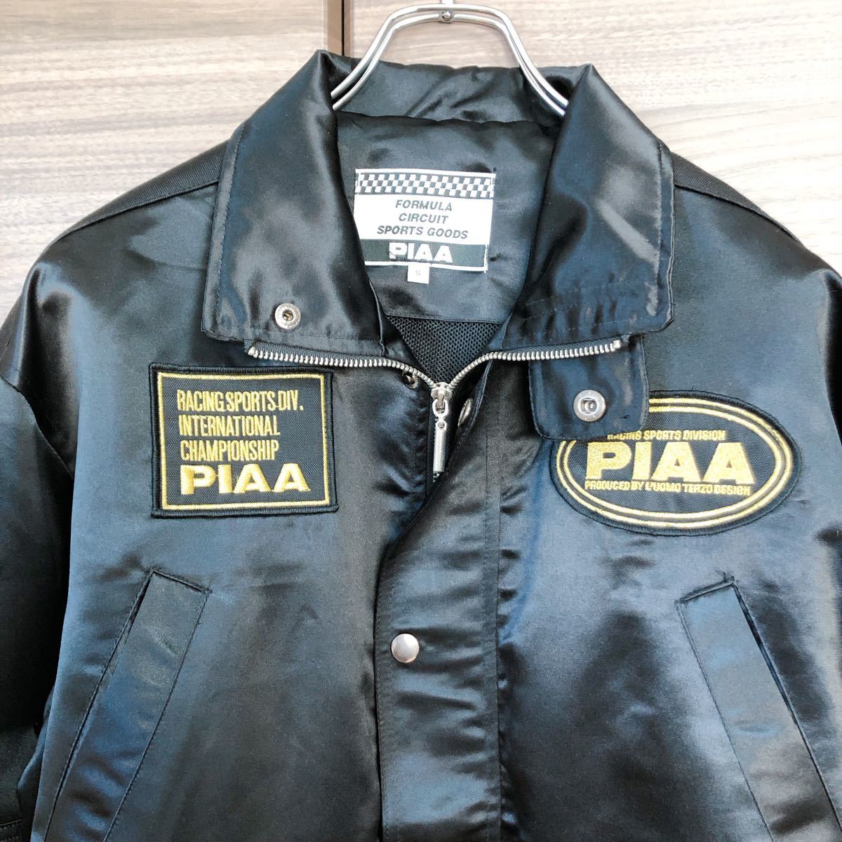 PIAA レーシングブルゾン ブラック/ゴールド | institutofairplay.org.br