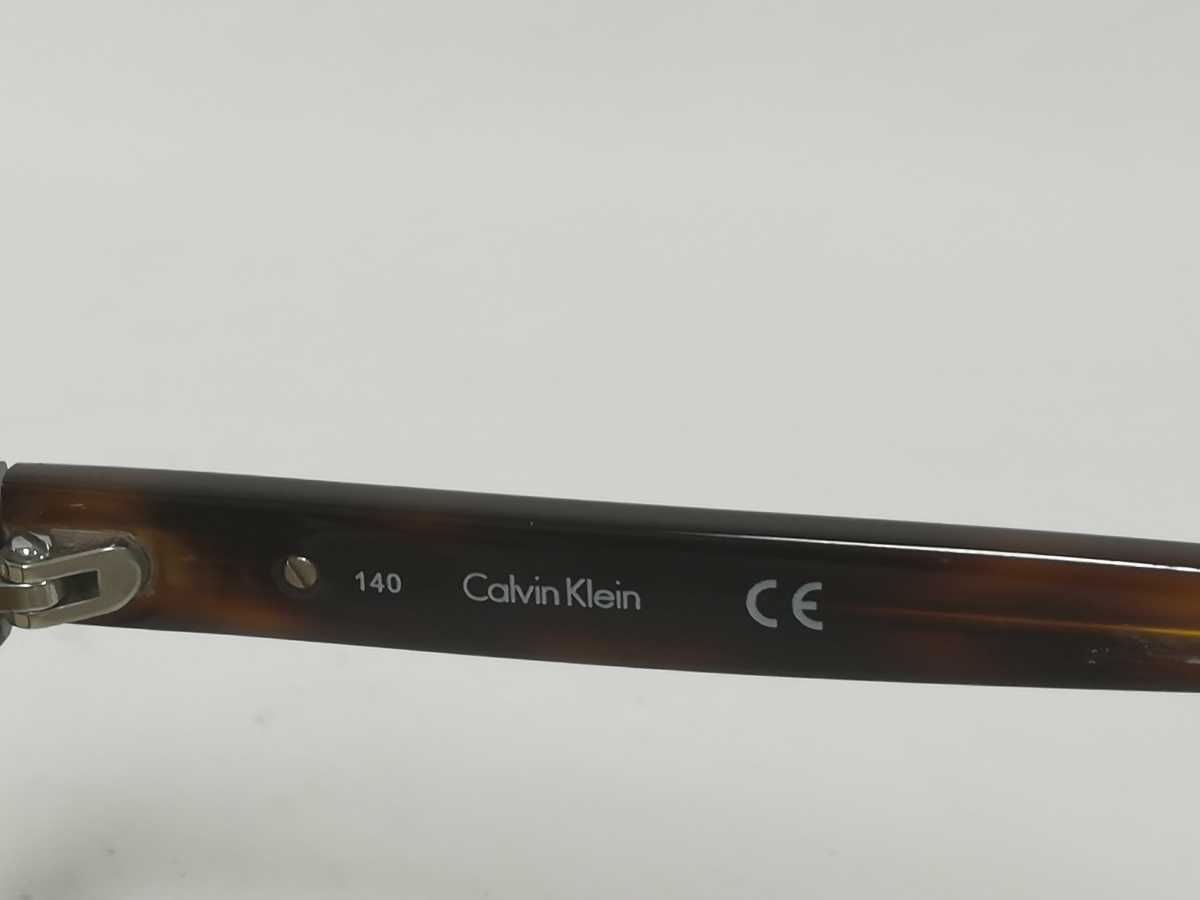 Calvin Klein солнцезащитные очки 4335 Calvin Klein Brown 115