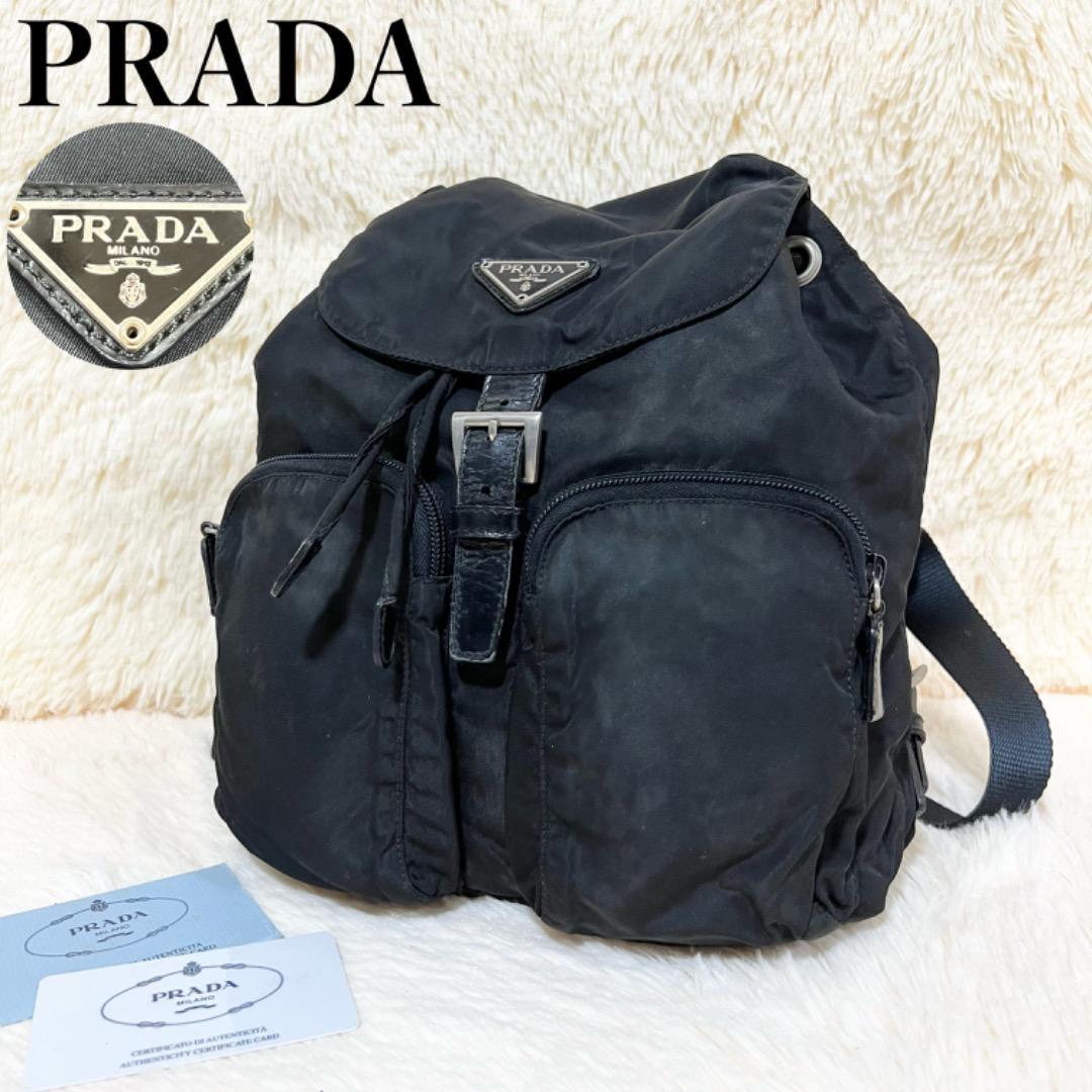 PRADA プラダ リュック 巾着 三角ロゴプレート ベルト ナイロン