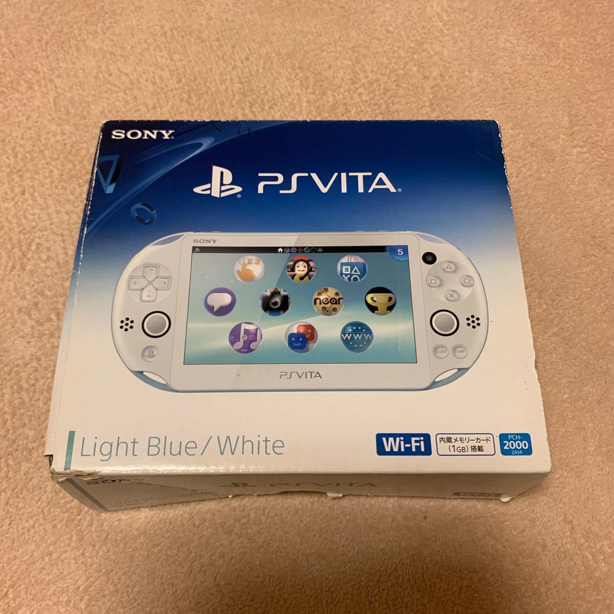 PlayStation Vita 本体　ライトブルー×ホワイト　GRAVITY DAZEソフト(ケース説明書無し)付き