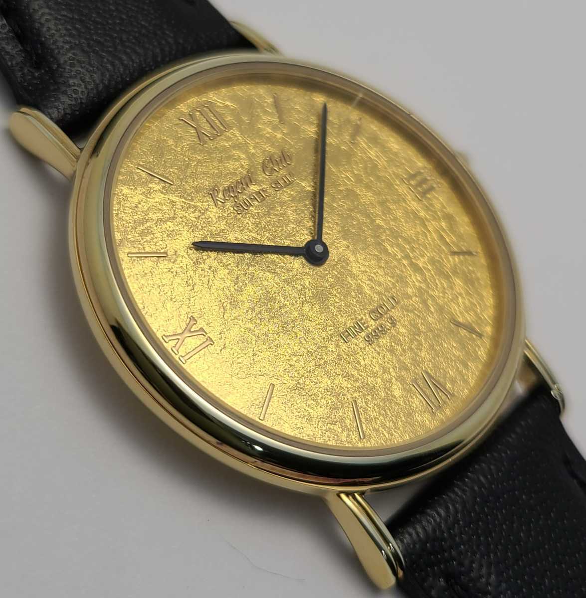 海外への送料無料 紳士用腕時計　クォーツ　ファインゴールド　純金文字盤！