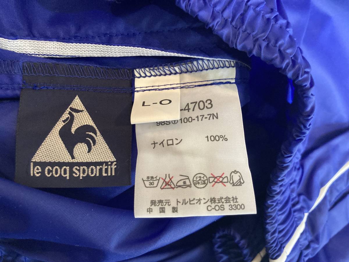 le coq sportif QS-4703 нейлон окно брюки L-O не использовался Le Coq Wind Pants брюки-джоггеры to рубин on неиспользуемый товар 90s