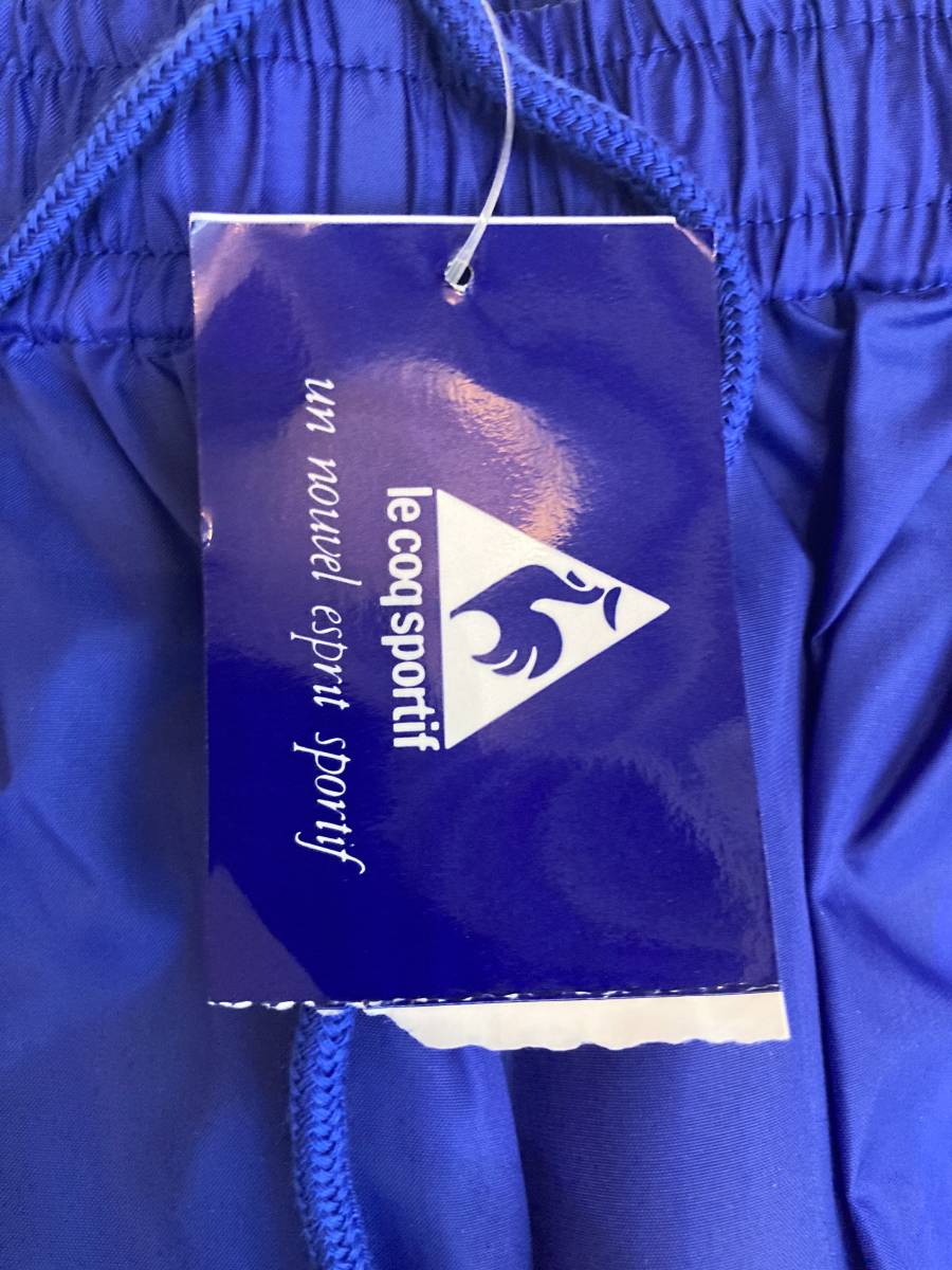 le coq sportif QS-4703 нейлон окно брюки L-O не использовался Le Coq Wind Pants брюки-джоггеры to рубин on неиспользуемый товар 90s