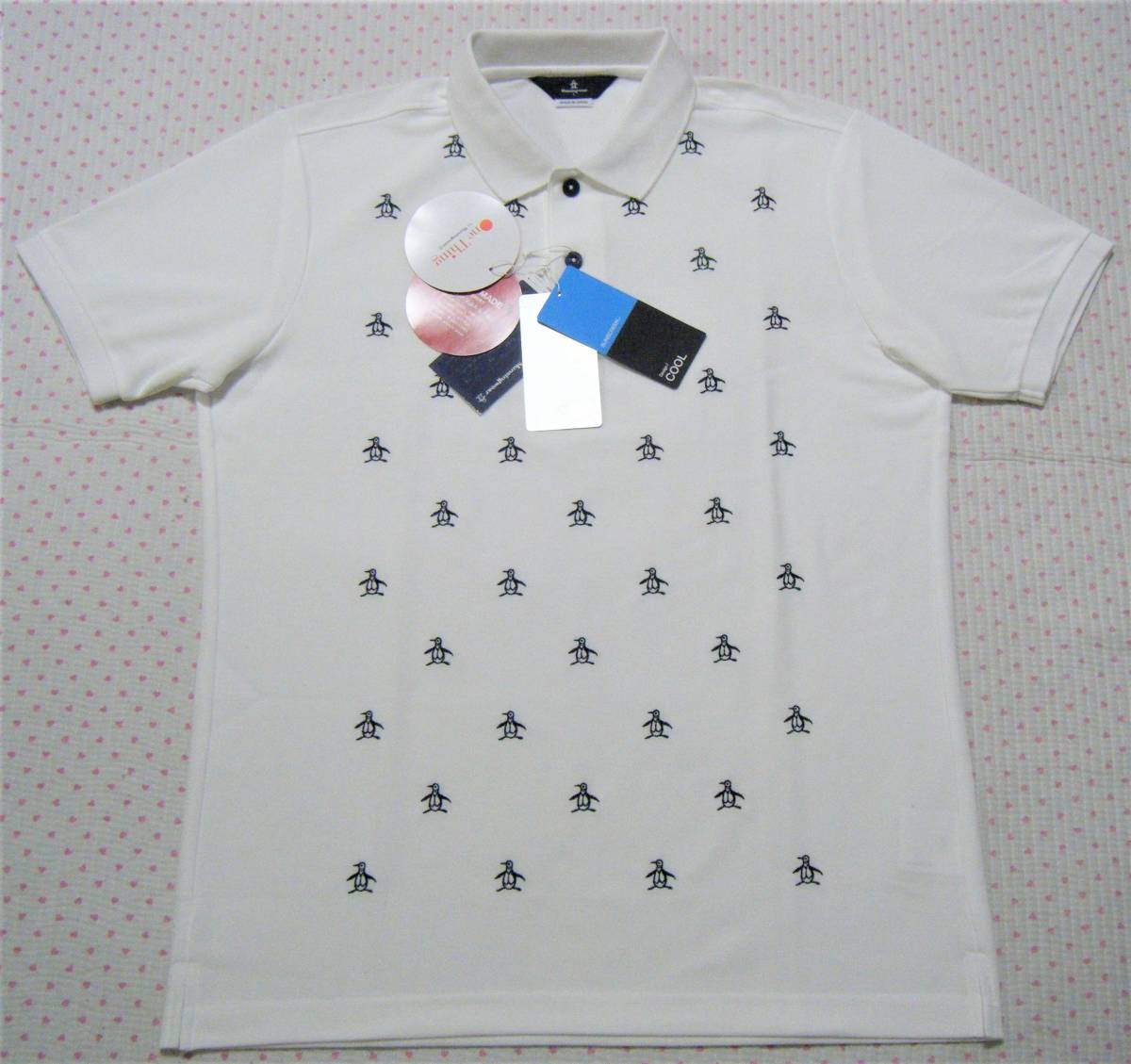 マンシング Munsingwear ゴルフ用高機能/涼感ポロシャツ 白色 マンシング Munsingwear ゴルフ用高機能/涼感ポロシャツ 白色