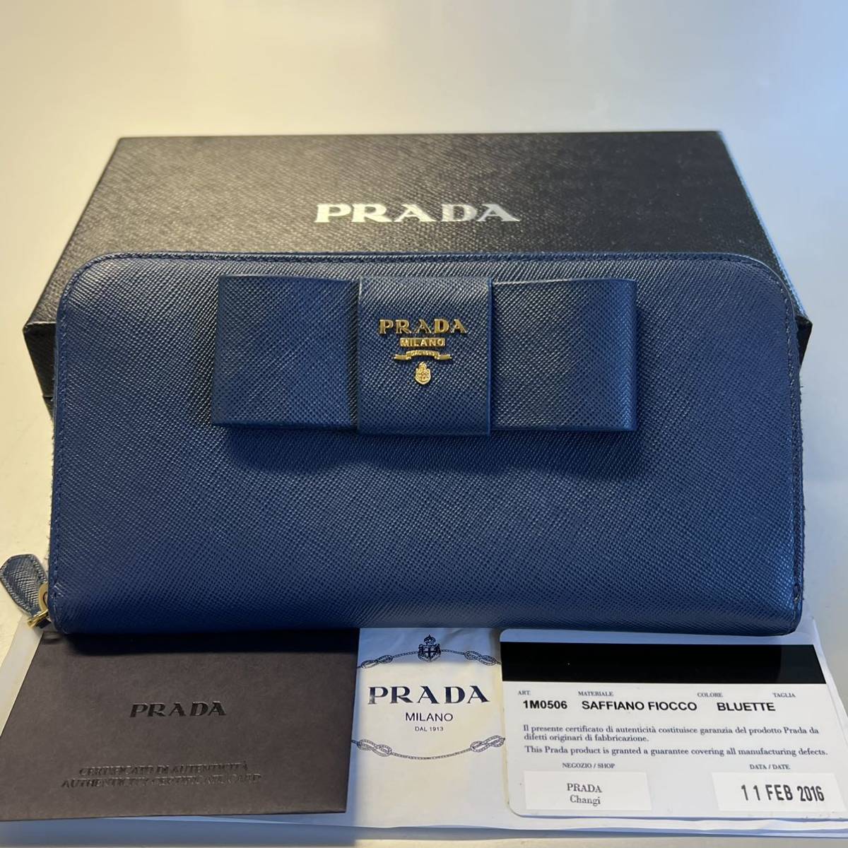 未使用に近い! プラダ PRADA 財布 長財布 サフィアーノレザー リボン