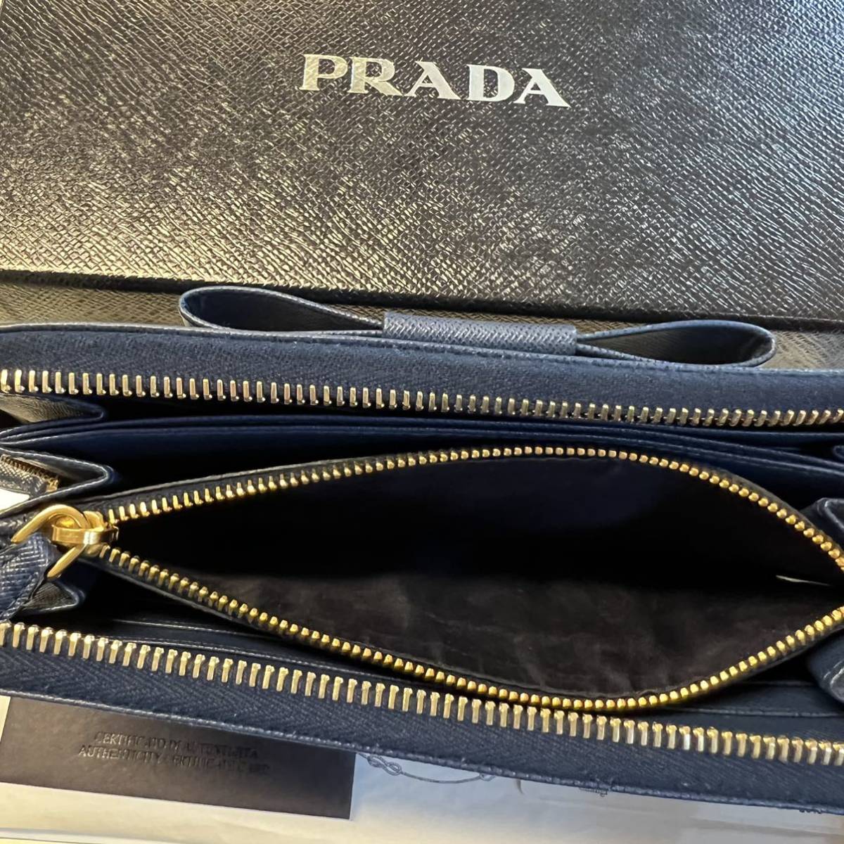 未使用に近い! プラダ PRADA 財布 長財布 サフィアーノレザー リボン