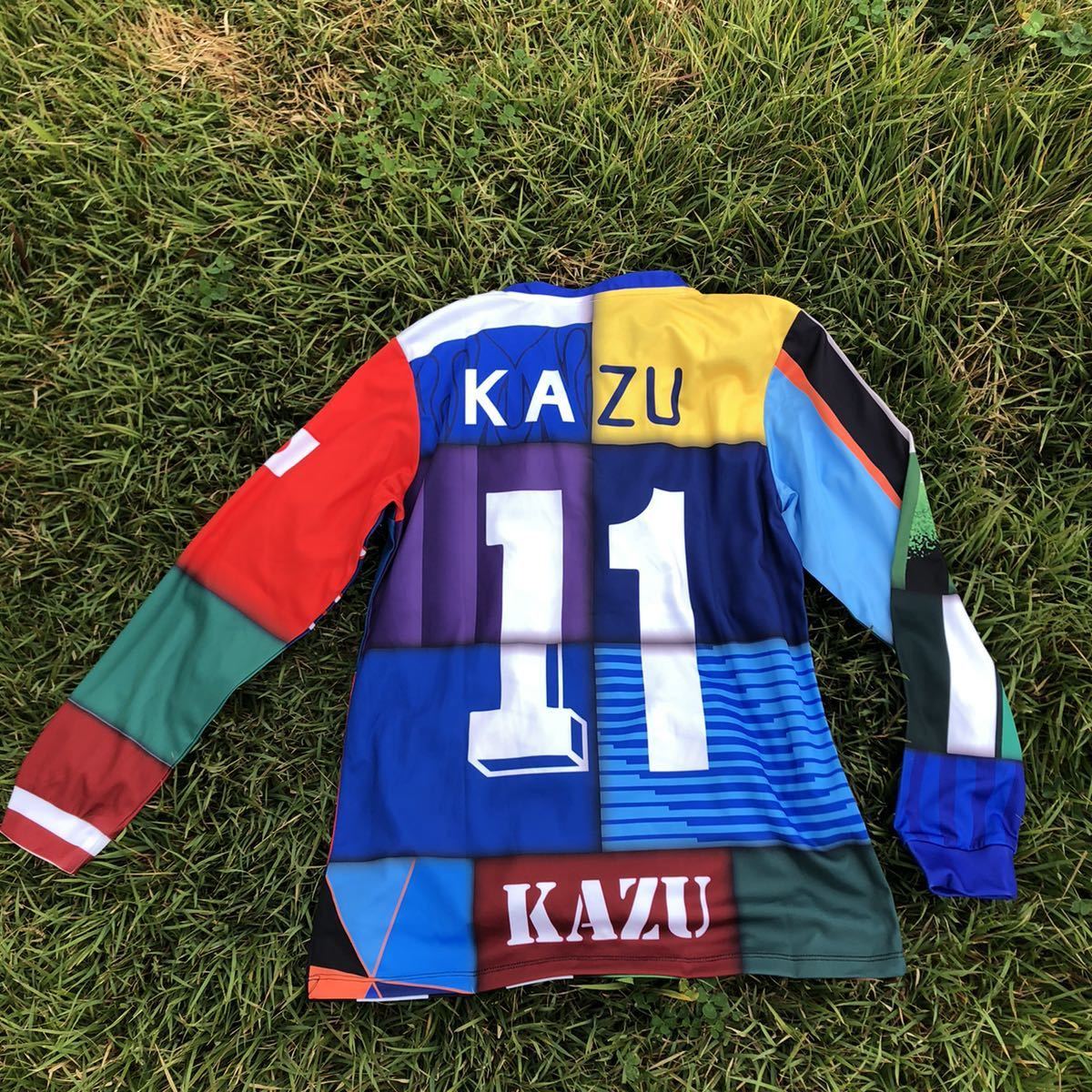 非売品【Lサイズ】三浦知良 歴代ミックスユニフォーム 長袖 日本代表 ヴェルディ川崎 横浜FC ヴィッセル神戸 京都サンガ KINGKAZU カズ