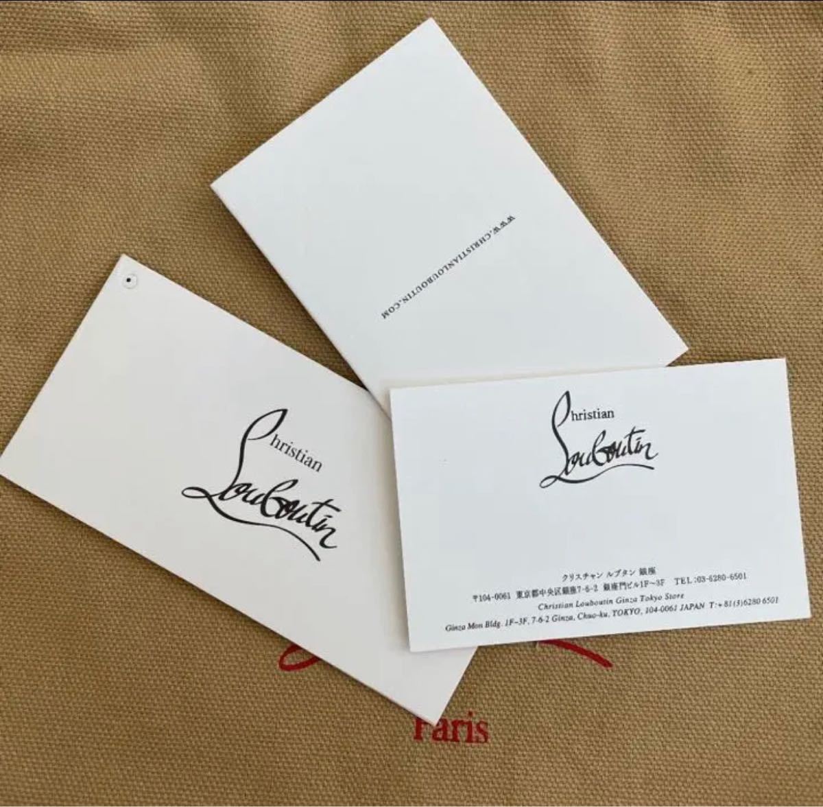 Christian Louboutinクリスチャンルブタン チャーム付きポーチ www