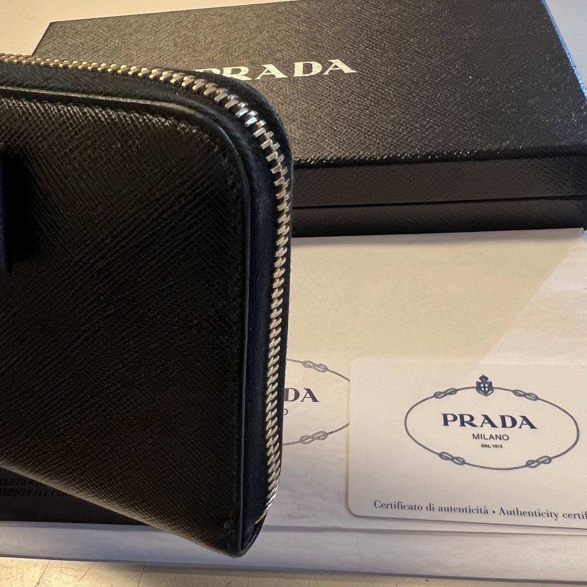 新品同様！ プラダ PRADA 財布 長財布 サフィアーノレザー リボン 