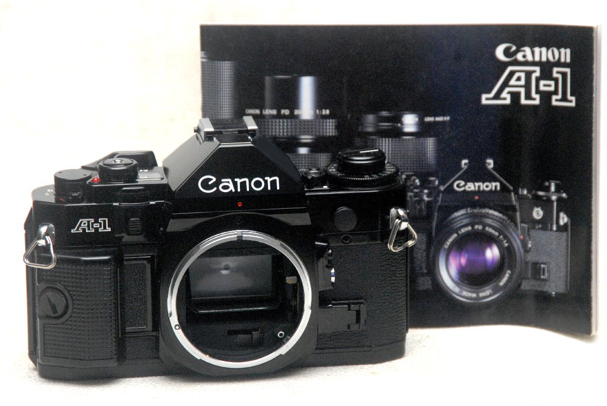 Canon キャノン 昔の高級一眼レフカメラ A-1 ボディ + （取説付）優良品 （鳴き無し）（腐食無し）_画像1