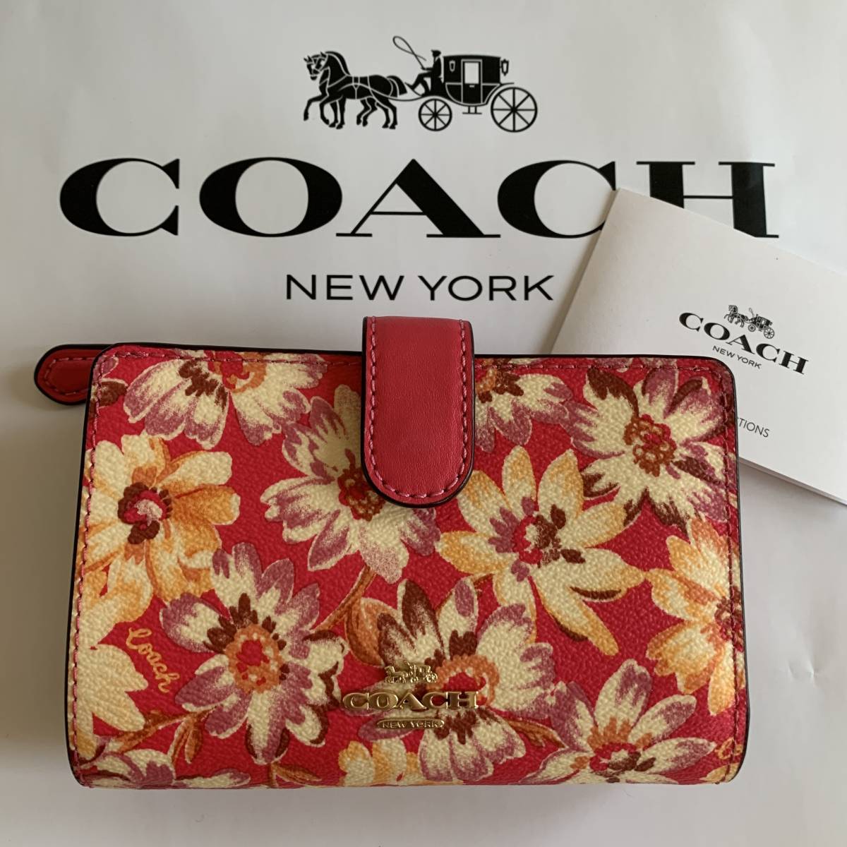 日本未入荷！コーチ3497COACH手書き風デイジー花柄が華やか2つ折り財布ミディアムウォレット