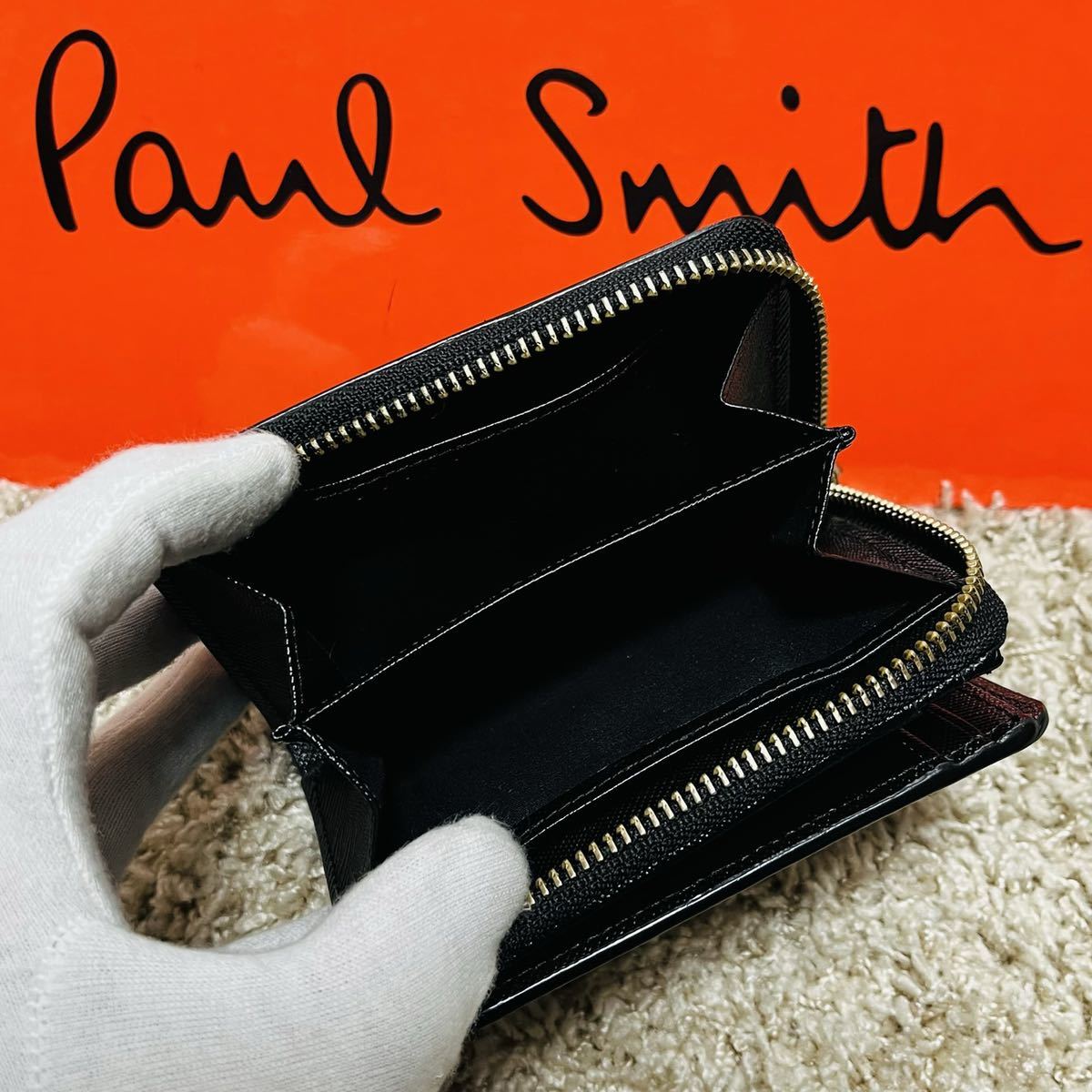 でおすすめアイテム。 Paul Smith ポールドローイング 二つ折り財布
