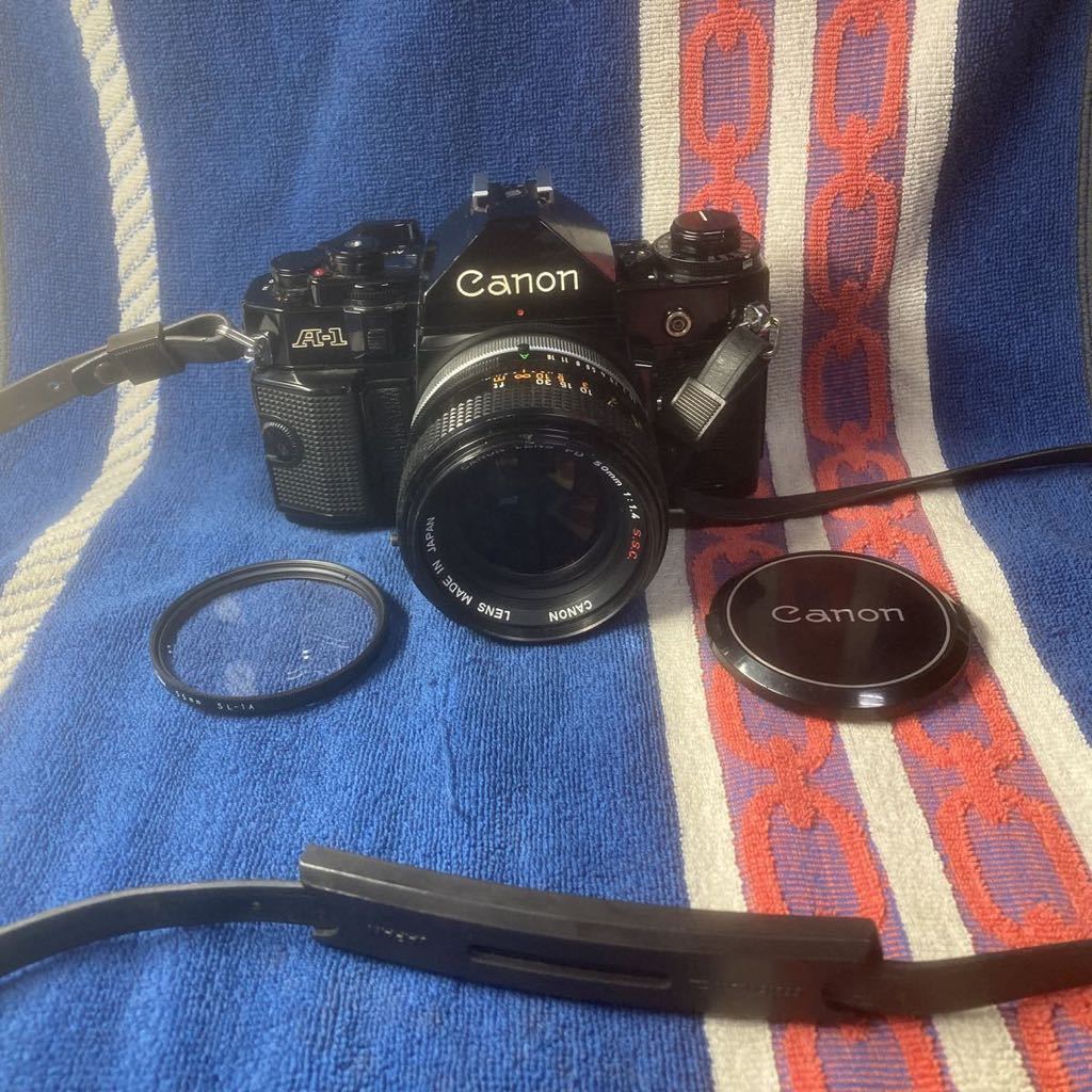 ★Canon A-1 ボディ+Canon FD 50mm F1.4 S.S.C. レンズセット ストラップ フィルター 前後レンズキャップ付属 _画像1