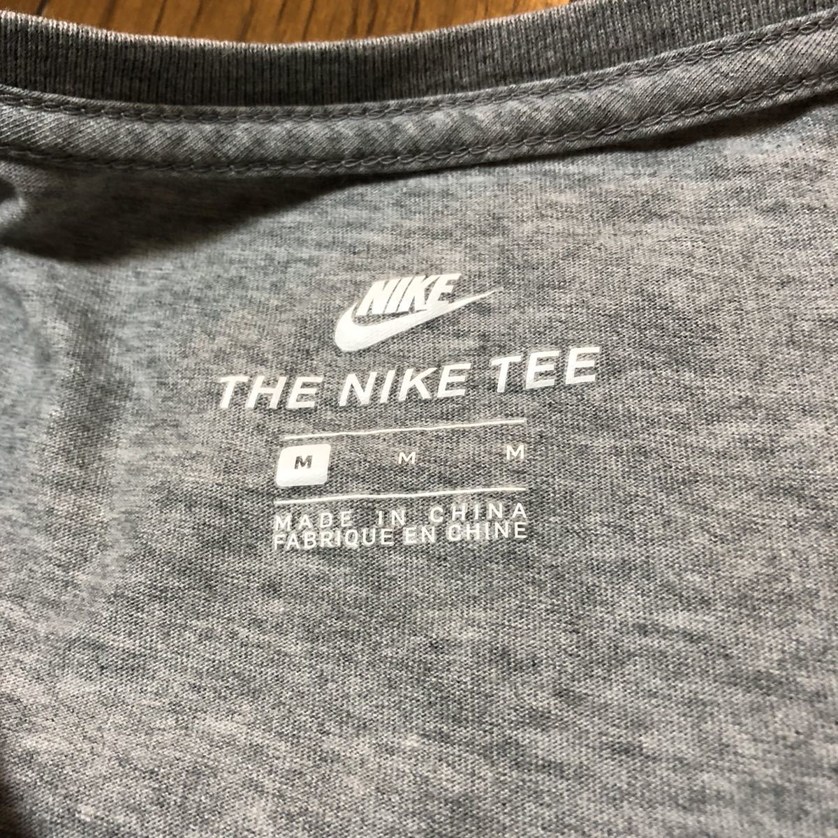 大きめMサイズ！ナイキ NIKE 古着長袖Tシャツ グレー デカスウォッシュ 中国製 小穴有り 長袖カットソー