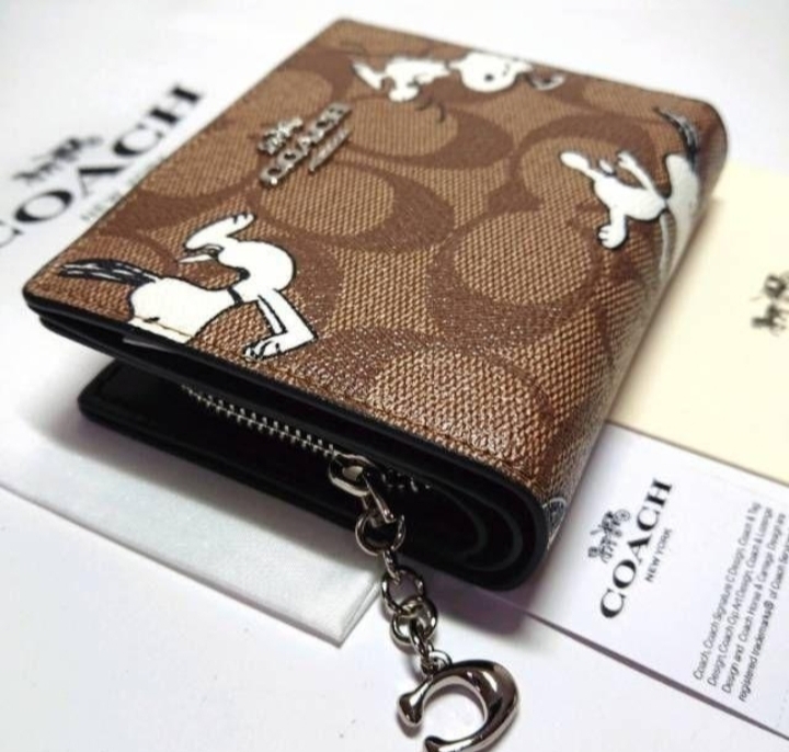 コーチ 二つ折り財布 PEANUTSコラボ スヌーピー - www.gigascope.net