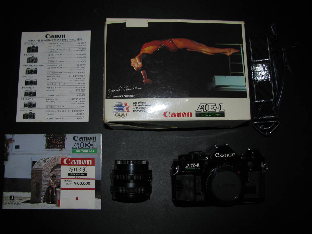Canon キヤノン フィルムカメラ AE-1 PROGRAM ブラック 中古 オリンピックベルト 元箱付属 最大57%OFFクーポン 95％以上節約 1:1.8レンズ 50㎜