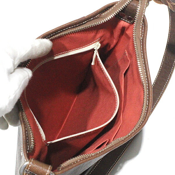 NUIZAEMON. left .. leather / tea shoulder bag 