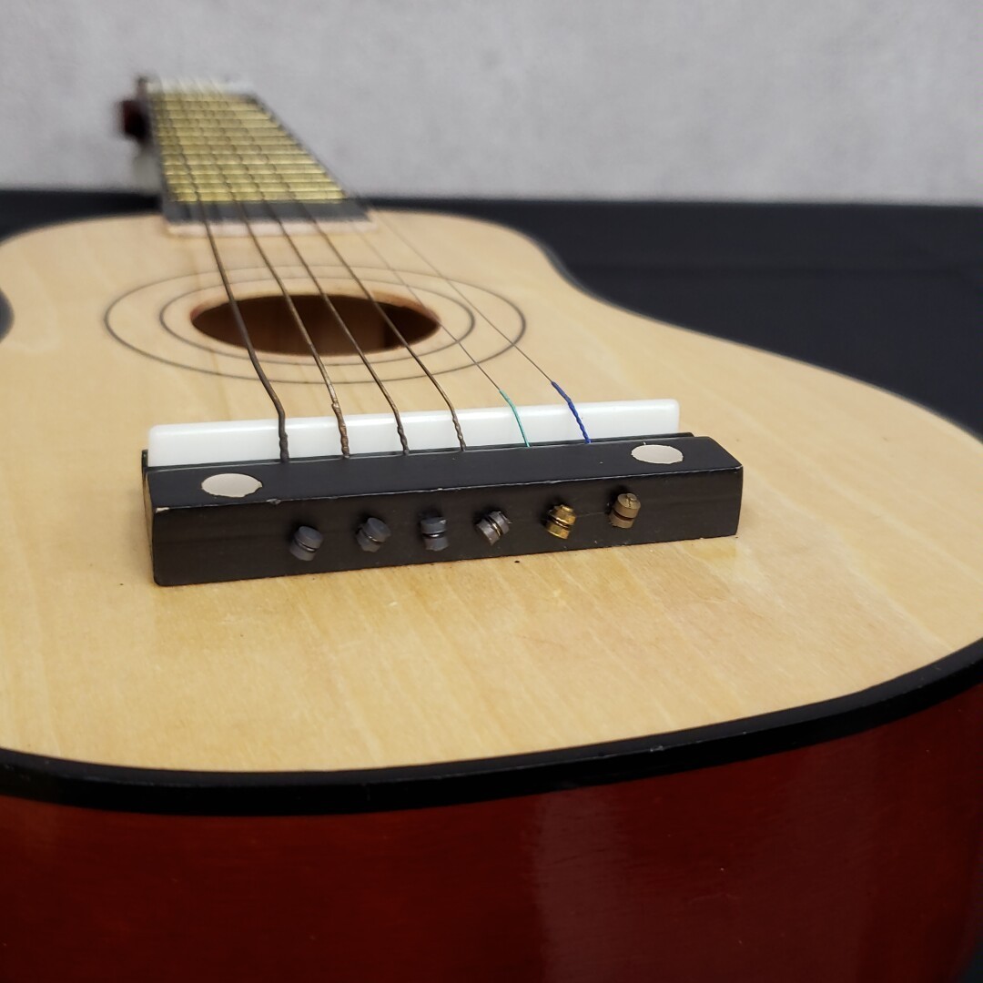[100ｙ1045]おもちゃ ギター楽器 玩具 STRING GUITAR UC21B 鳴りもの　小型　ミニ 全長約54cm