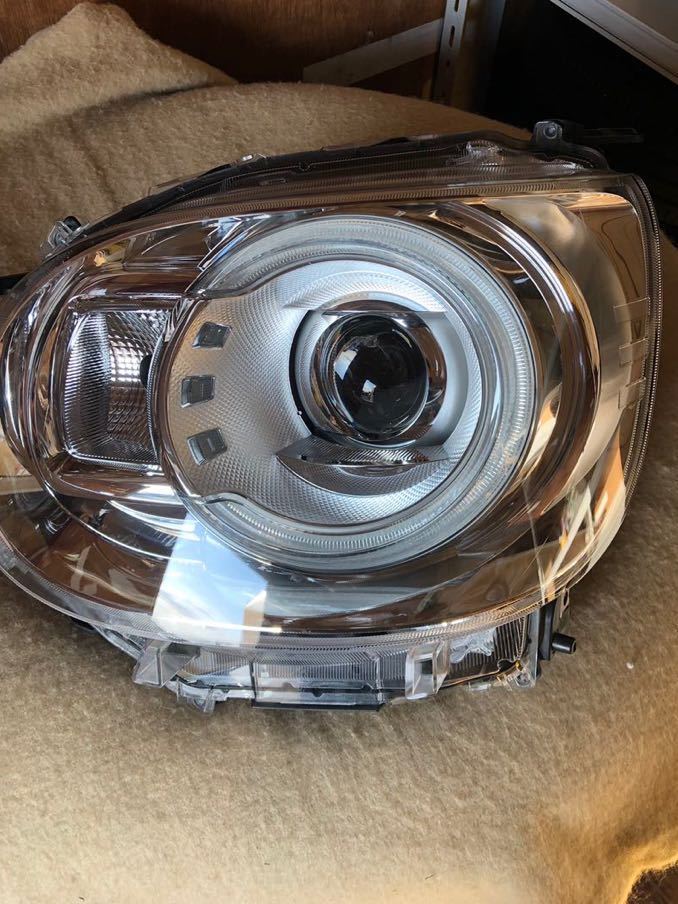 評価 中古部品 ムーヴキャンバス LA800S 左ヘッドランプ acornproperties.co.uk