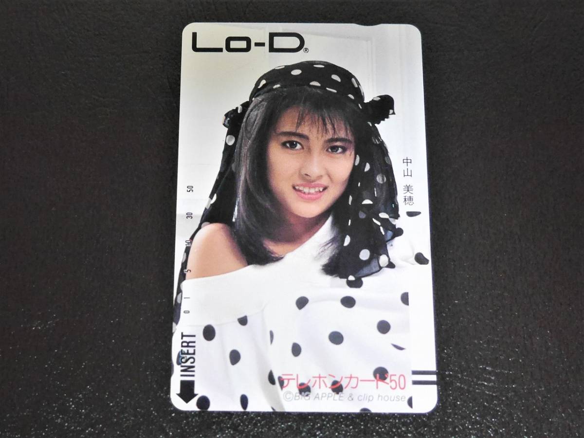 ◆m20◆中山美穂 テレカ/テレフォンカード 50度数 Lo-D　110-20100　アイドル コレクション レトロ 定形郵便84円発送可◆未使用 保管品 *68_画像と若干お色目が異なる場合がございます