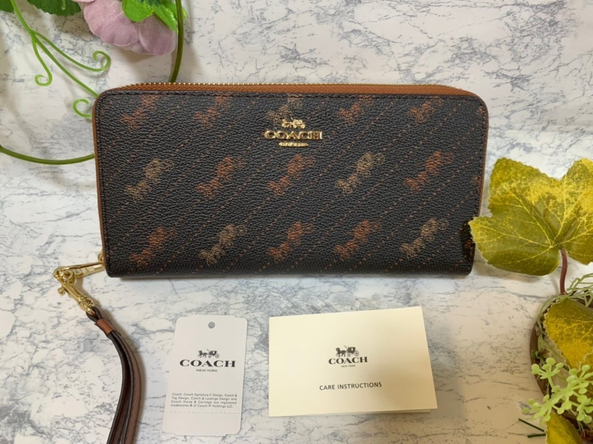 一番の COACH コーチ 新品 クリーム 馬車 レディース 長財布 黒 財布