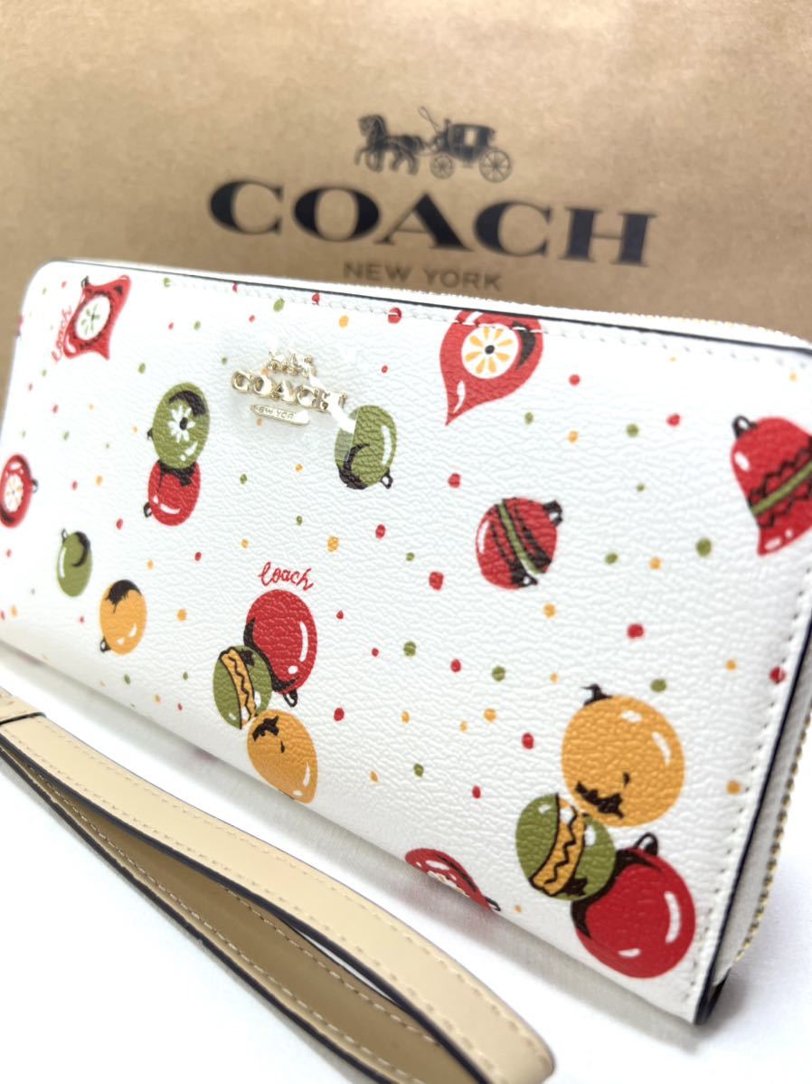 お1人様1点限り】 COACH オーナメント プリント ジップアラウンド 長