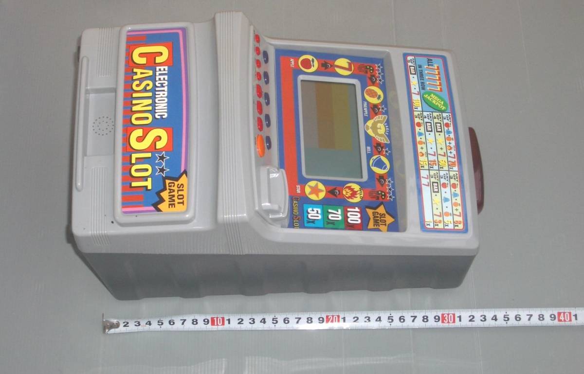 ツクダ 電子カジノ スロットマシン 貯金箱 (美品、動作OK 高さ ツクダ 電子カジノ スロットマシン 貯金箱 (美品、動作OK 高さ