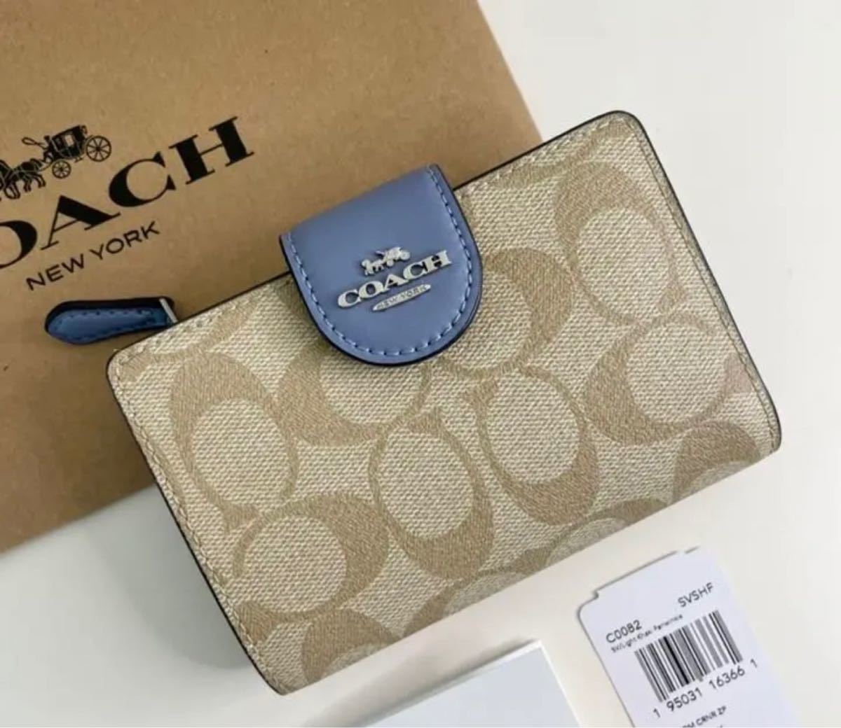 COACH コーチ シグネチャー ライトブルー 水色 二つ折り財布 C0082