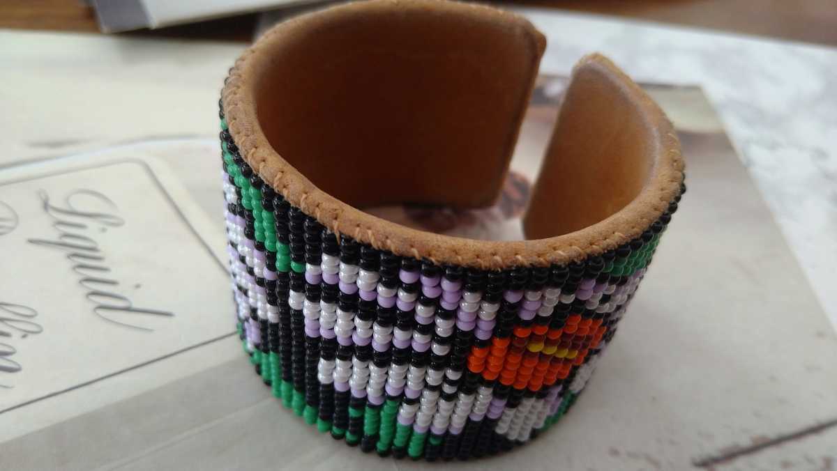 * black * green. orange * light purple beads * floral print. futoshi bangle *