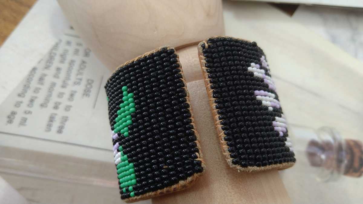 * black * green. orange * light purple beads * floral print. futoshi bangle *