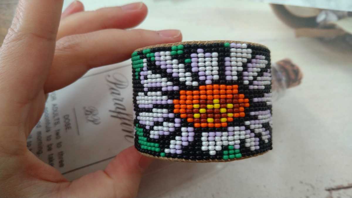 * black * green. orange * light purple beads * floral print. futoshi bangle *