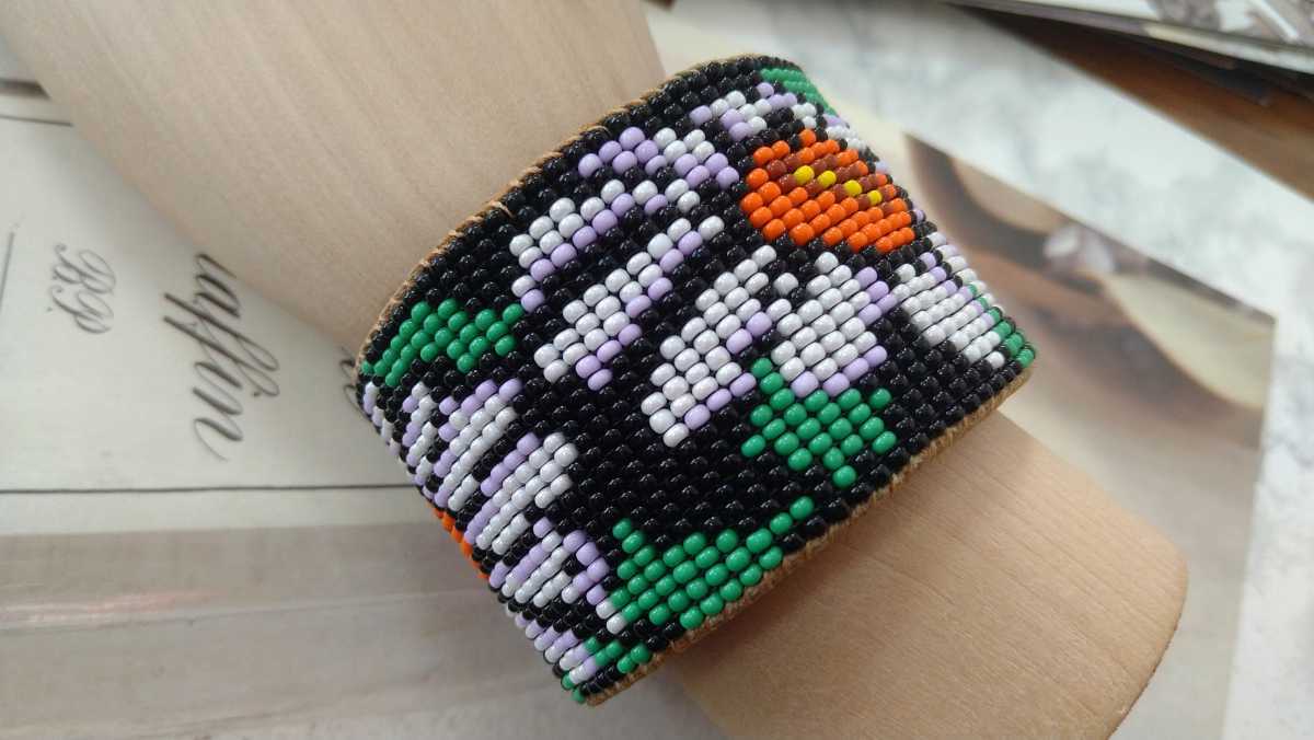 * black * green. orange * light purple beads * floral print. futoshi bangle *