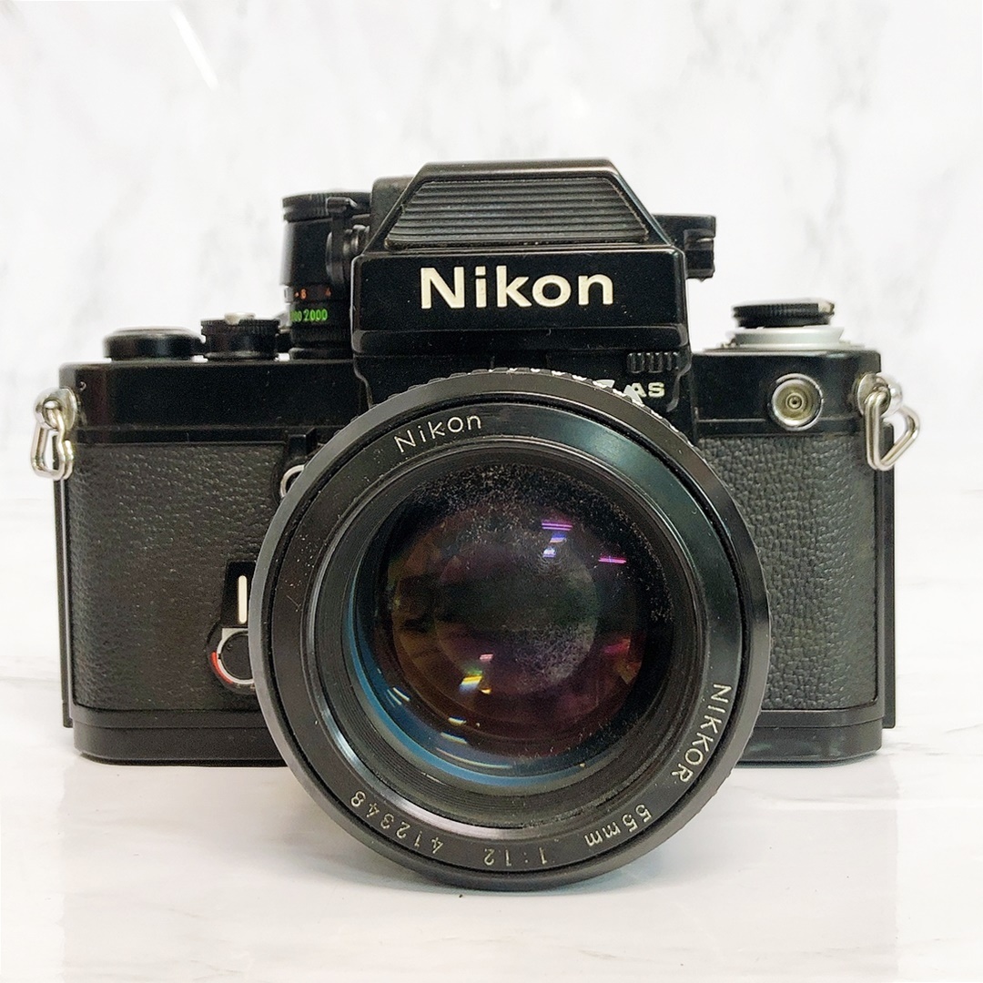 ④ニコン F2 7755677 一眼レフ フィルムカメラ ブラック フィルター レンズ付き（NIKKOR 55mm 1：1.2）動作未確認 ジャンク_画像2