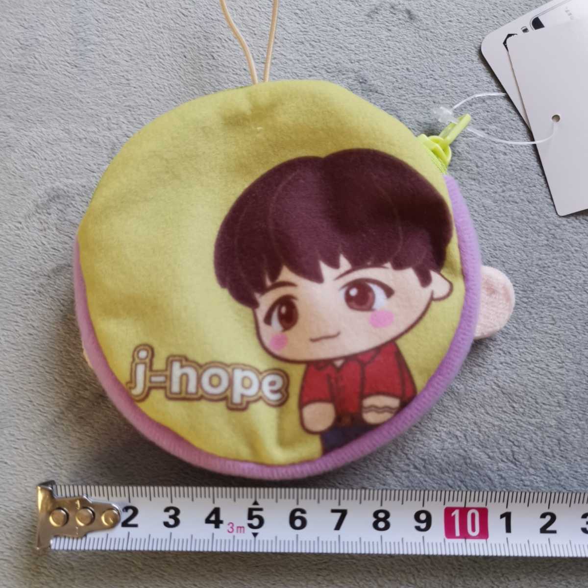 TinyTAN Thai knee tongue J-hopemo Aplus Mini pouch BTS prize tag equipped pouch 