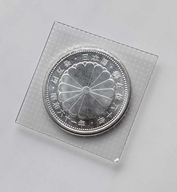 天皇陛下御在位60年 記念硬貨 1万円銀貨(昭和)｜売買された 