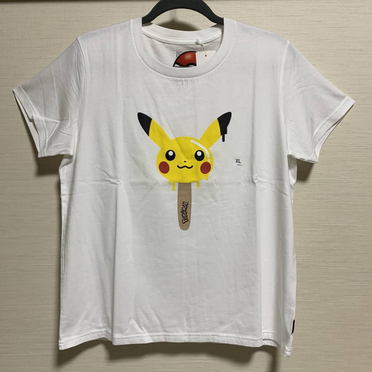 UNIQLO(ユニクロ) - WOＭEN UTGP ポケモン UT グラフィック Tシャツ 半袖 未使用・XLサイズ・ホワイト・人気完売 販売終了品 ピカチュウ_画像1