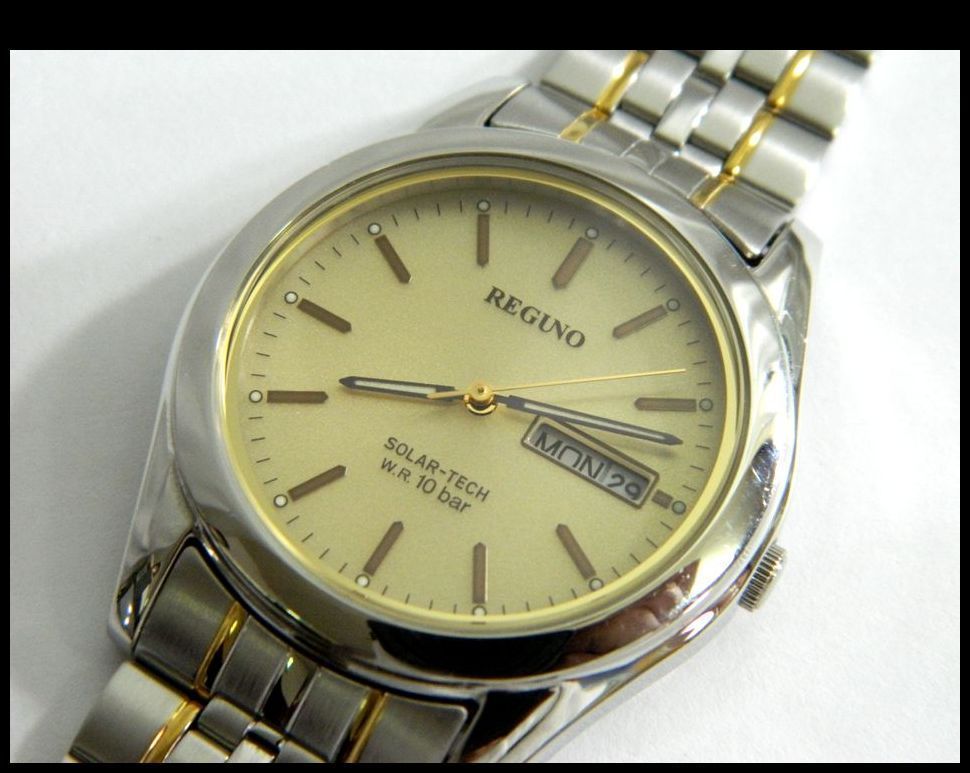 動作品 REGUNO ソーラーテック メンズ 腕時計 E101-K005299 3針 デイデイト ゴールド シルバー SS 男性用時計 レグノ 中古 USED品
