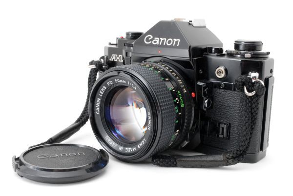 #918 キャノン 実物 Canon A-1 + New FD 1.4 F 動作確認済 標準レンズセット フィルム 50mm 【90％OFF】 一眼レフカメラ