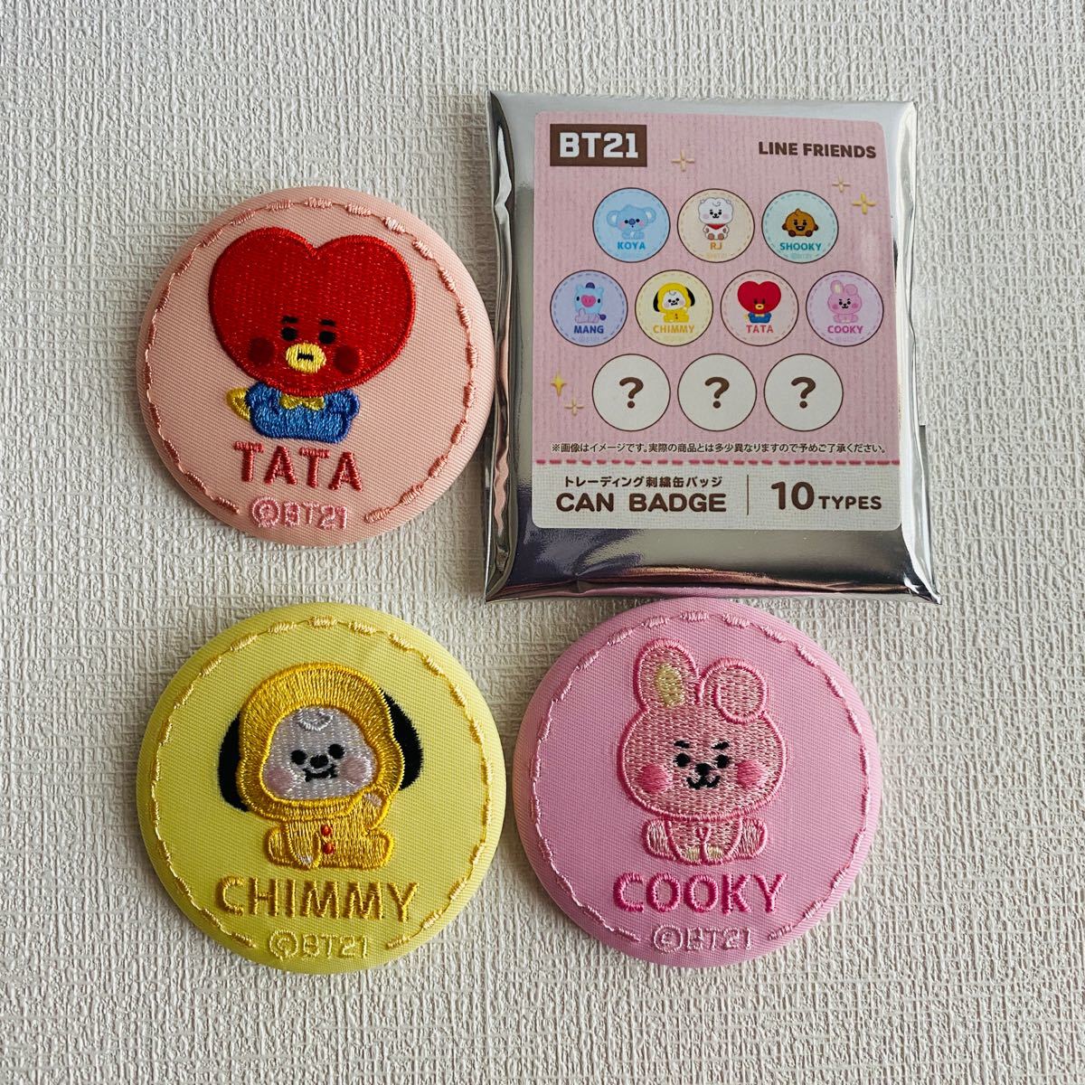 BT21 缶バッチ TATA - キャラクターグッズ