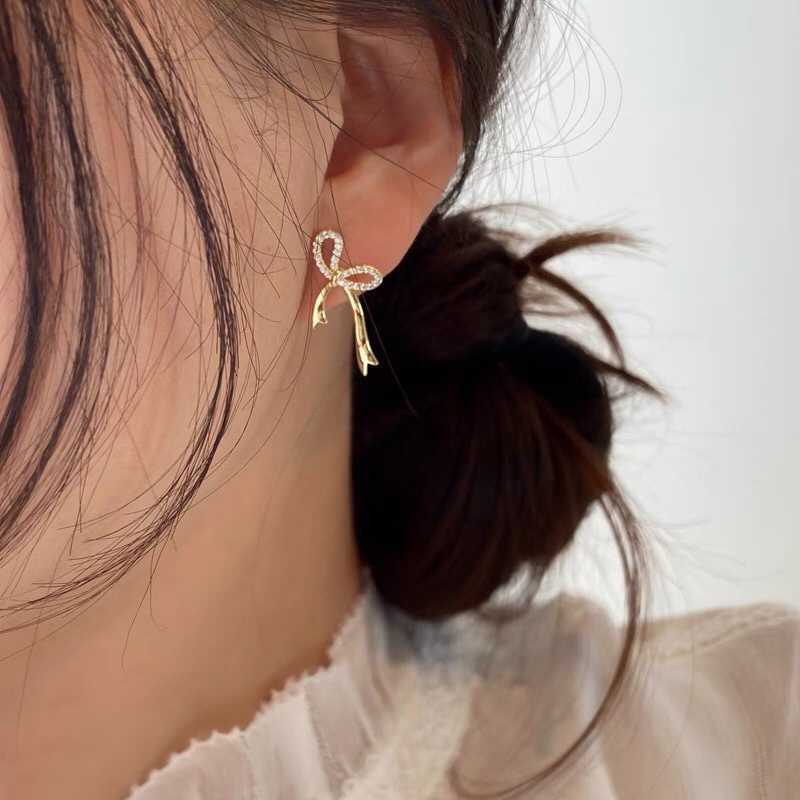リボンモチーフ 天然ダイヤモンド付きピアスk18 | cottonclub.hr