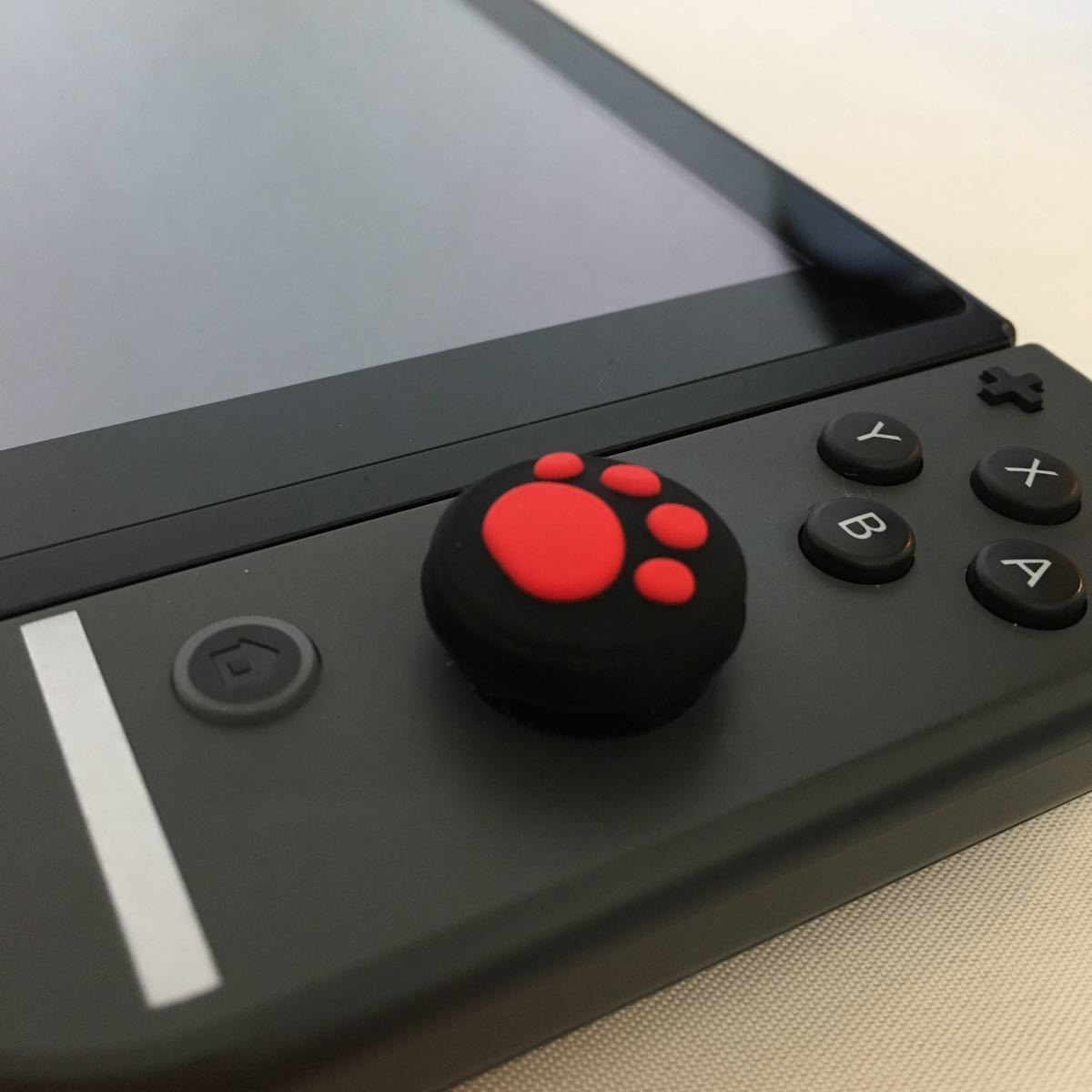 Nintendo Switch　ニンテンドー　スイッチ　ジョイコン　スティックカバー　肉球　2個セット　ライト、有機ELにも対応