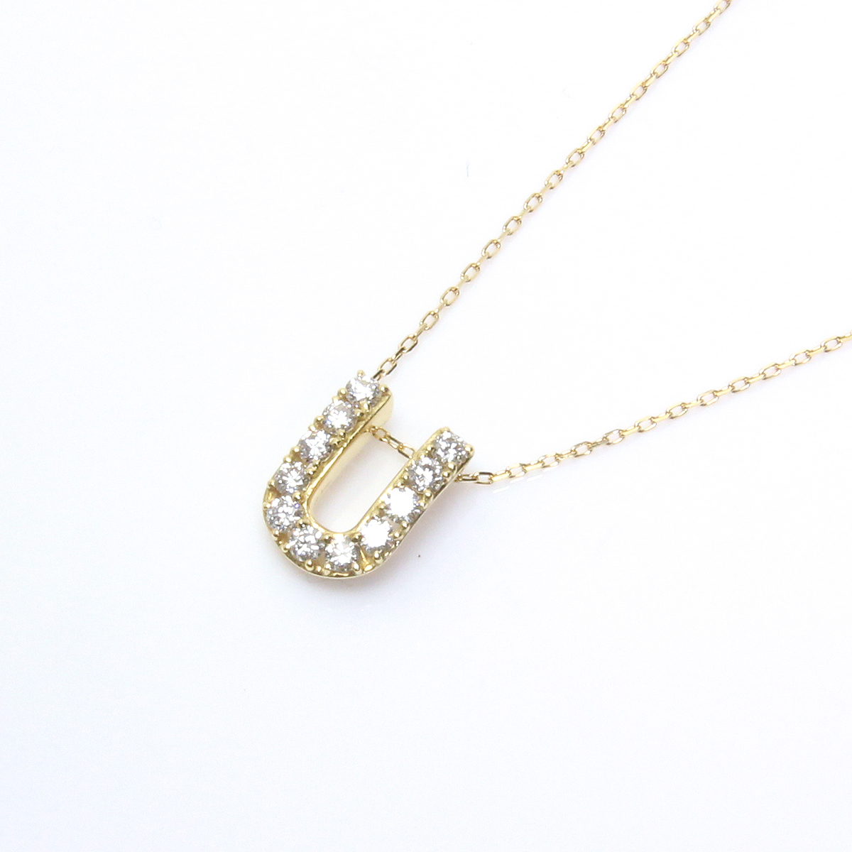 美品 アーカー K18YG プルミエトワール イニシャル U ネックレス D0.22